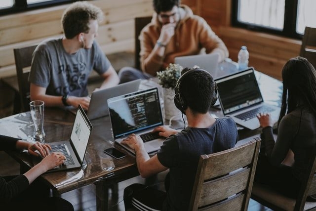 Group of students with laptops