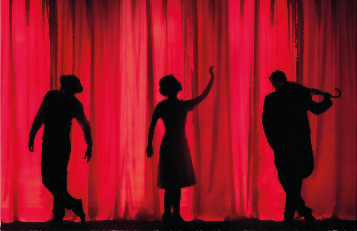 Silhouette of three people standing on a stage.