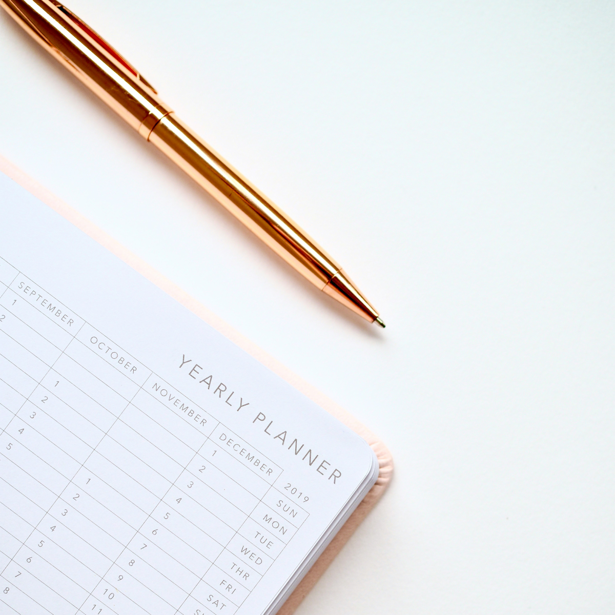 Pen next to a page which says 'Yearly planner'.