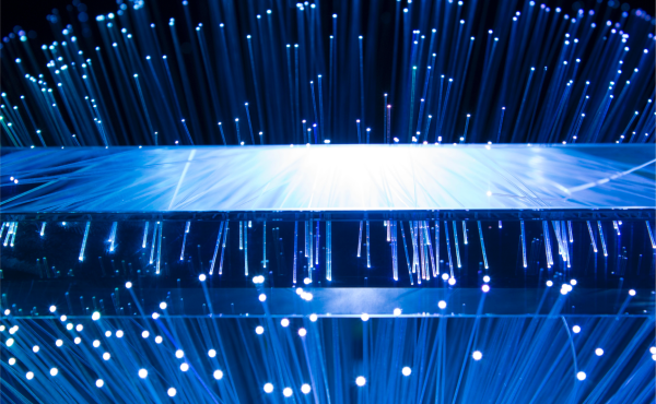 Blue lights, mirroring from a screen.