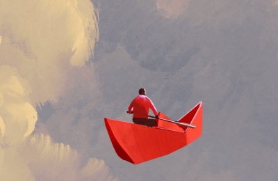 Paddling on paper boat in the clouds