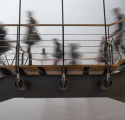 Image people walking down flight of stairs